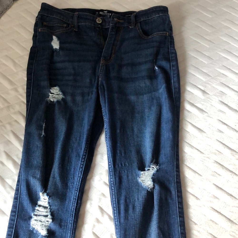 Dark distressed skinny jeans